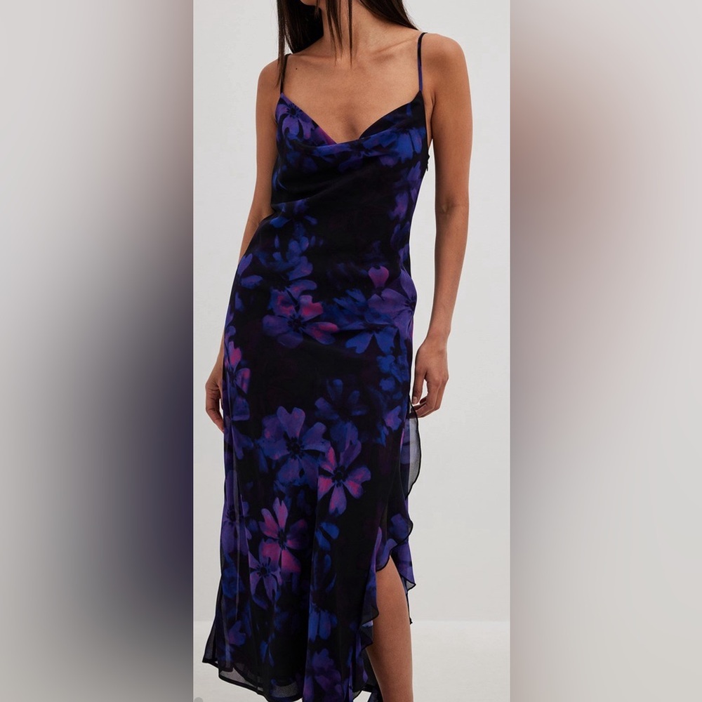 Beautiful summer dress in purple, pink, black tones with ruffles